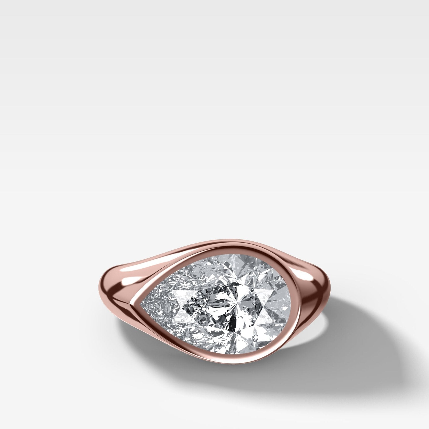 Tapered Bezel Signet Engagement Ring with East West Pear Cut Diamond