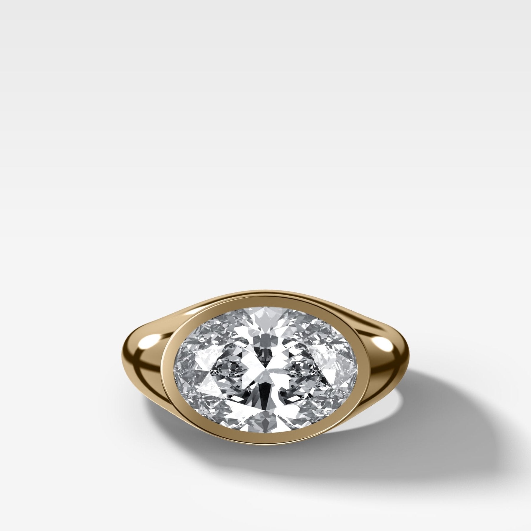 Tapered Bezel Signet Engagement Ring with Oval Cut Diamond