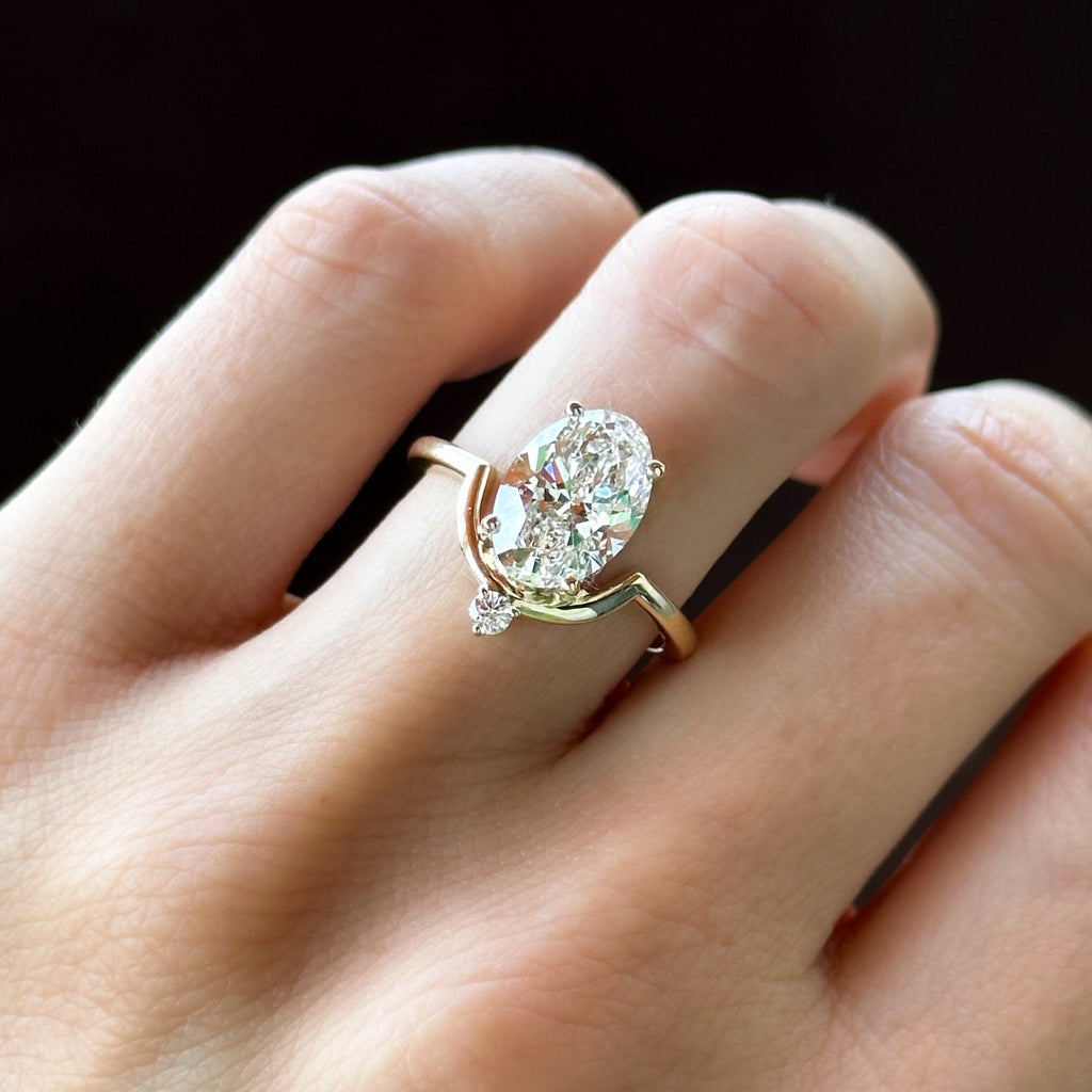 Taurus Engagement Ring with an Oval Cut Diamond