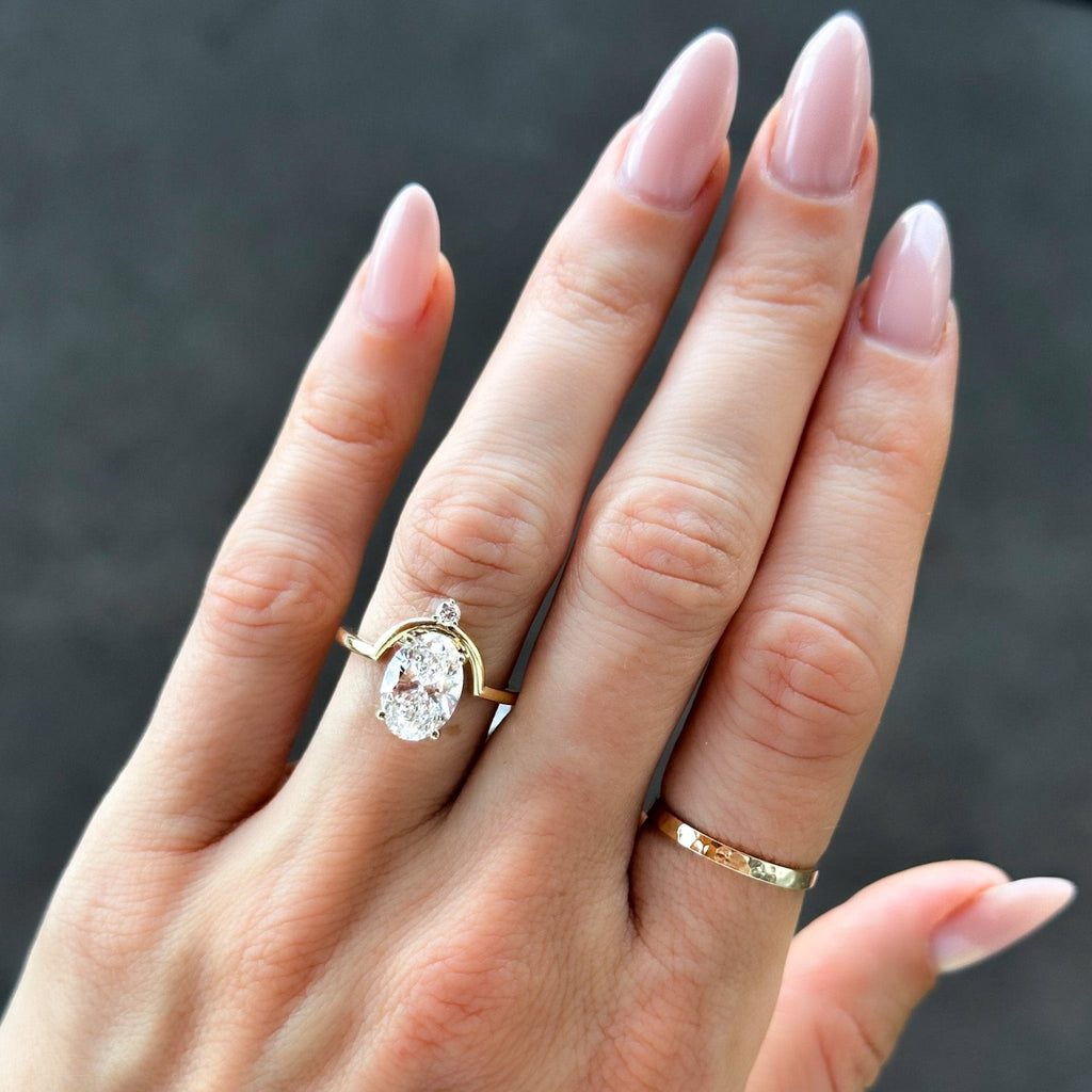 Taurus Engagement Ring with an Oval Cut Diamond