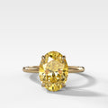 Thin + Simple Solitaire Engagement Ring With Canary Yellow Oval Cut Diamond
