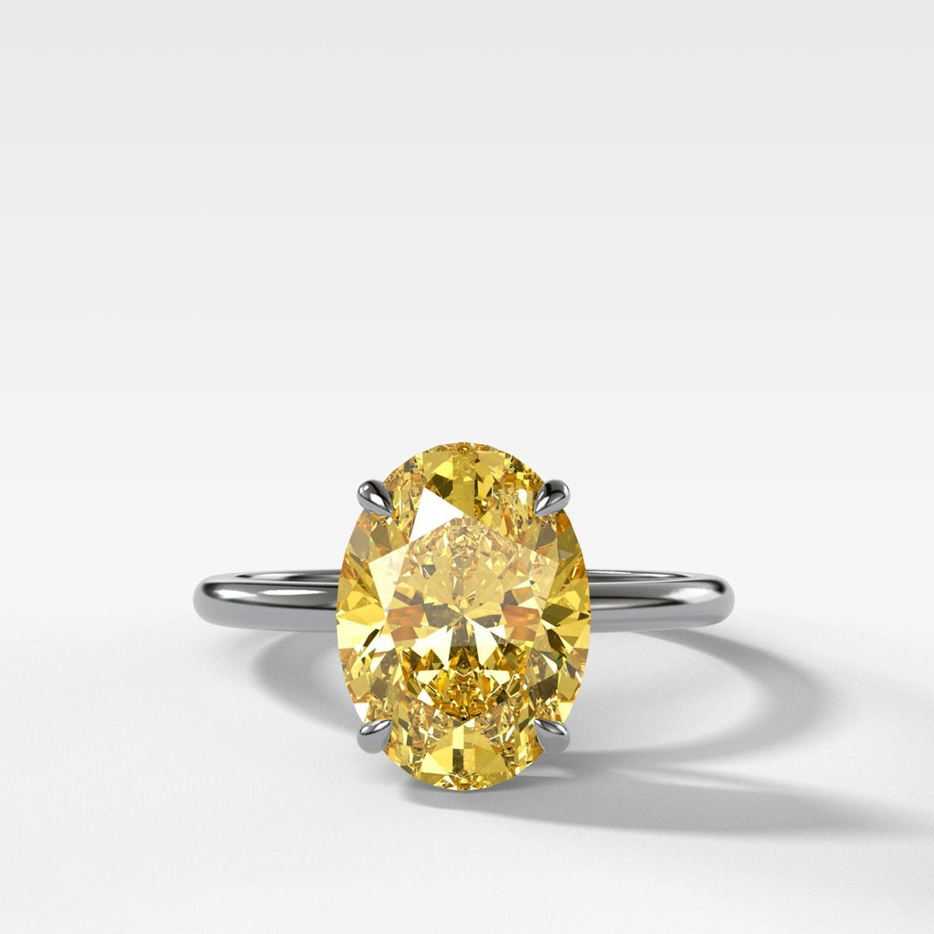 Thin + Simple Solitaire Engagement Ring With Canary Yellow Oval Cut Diamond