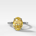 Thin + Simple Solitaire Engagement Ring With Canary Yellow Oval Cut Diamond