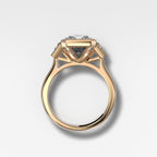 Three Stone Bezel Set Engagement Ring with Trapezoid Side Diamonds and an Elongated Radiant Cut
