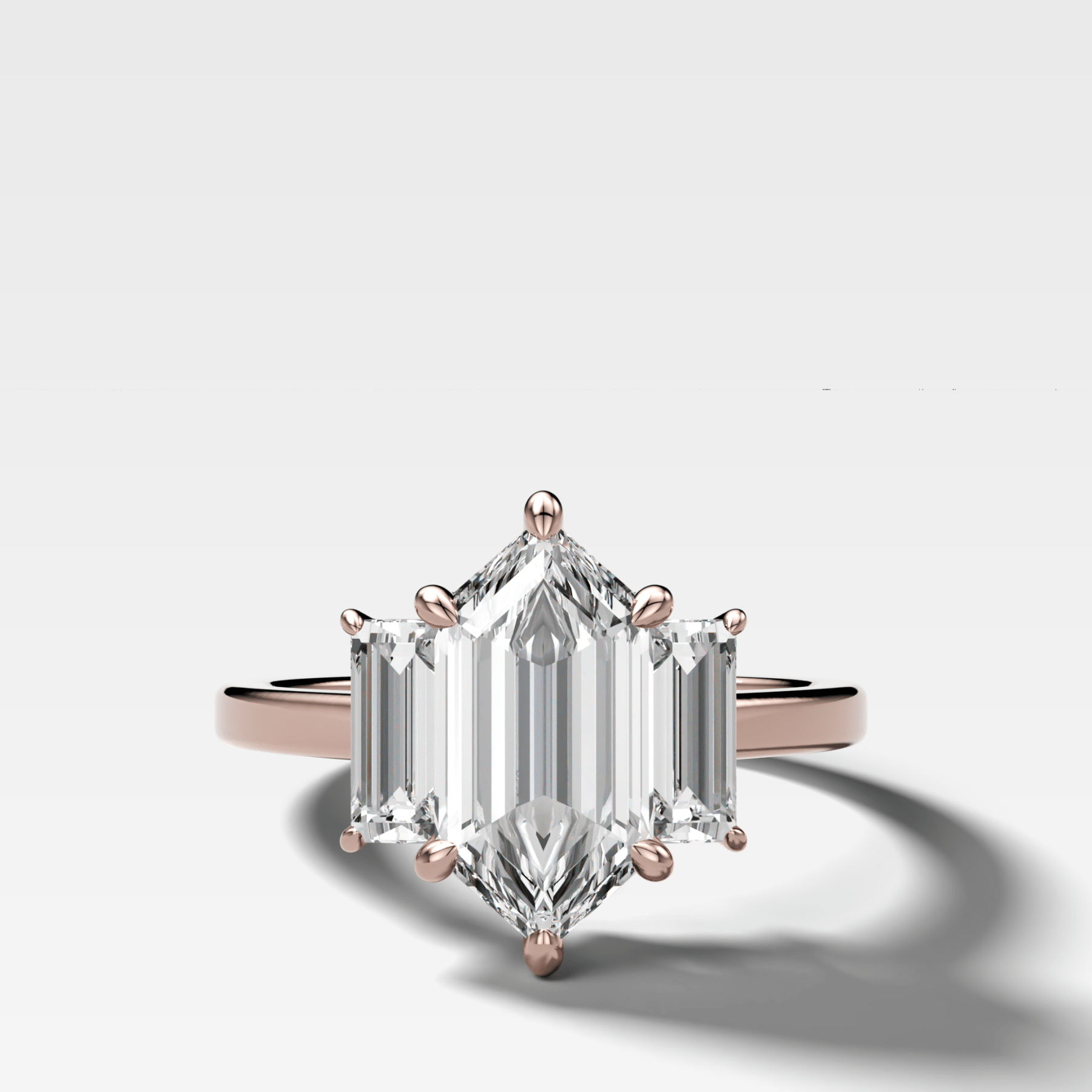 Three Stone Engagement Ring with Baguette Side Stones and Dutch Marquise Cut Diamond