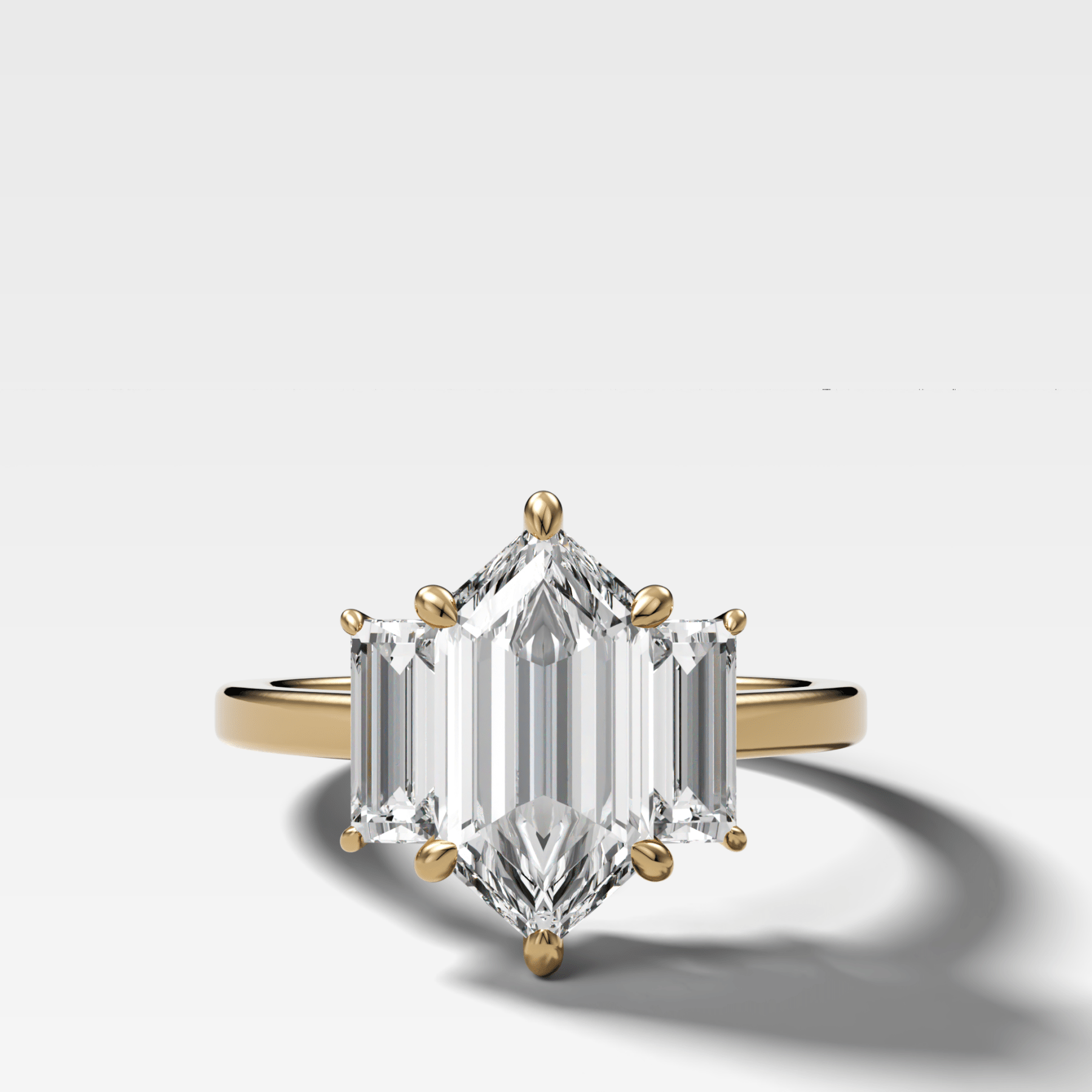Three Stone Engagement Ring with Baguette Side Stones and Dutch Marquise Cut Diamond