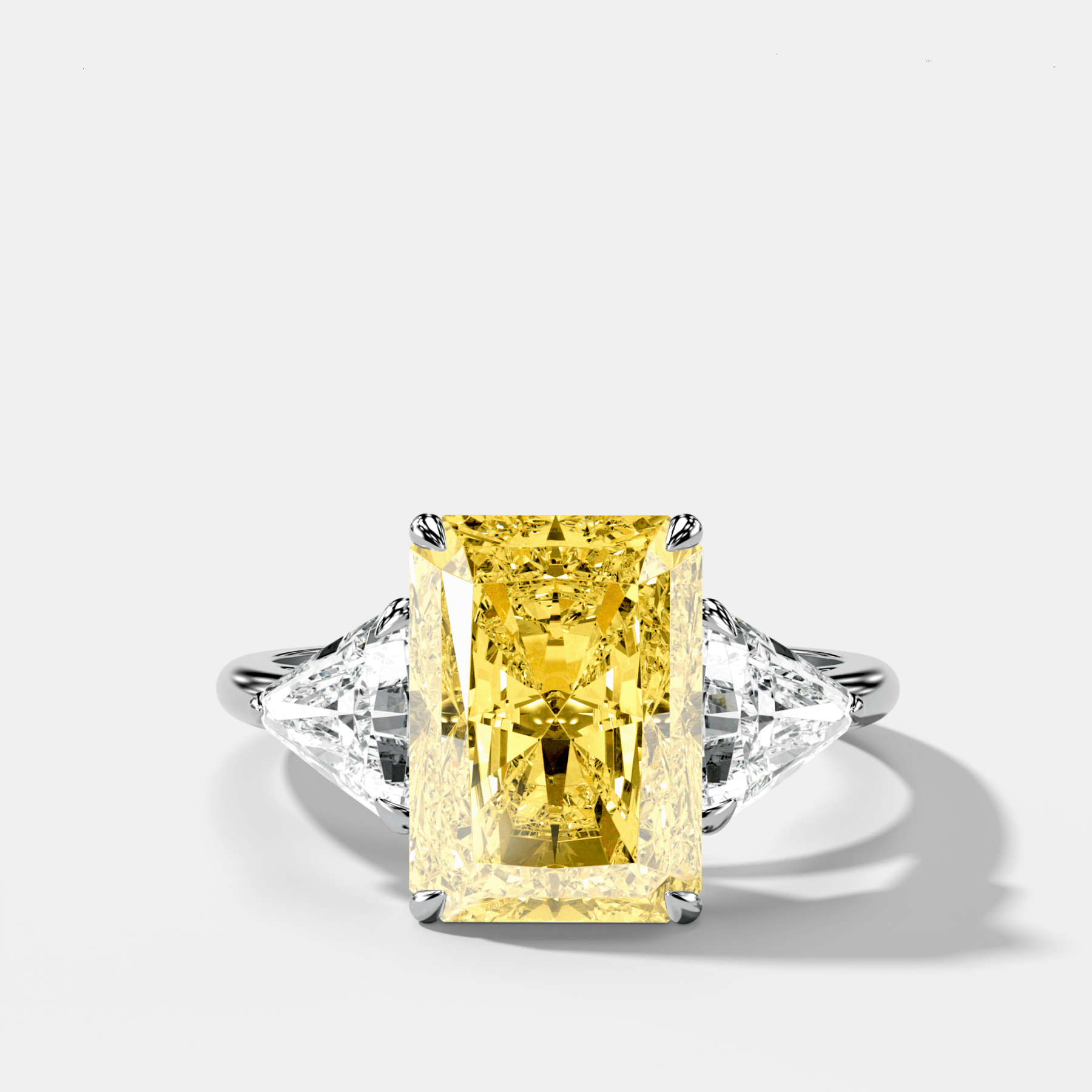 Three Stone Engagement Ring With Canary Yellow Elongated Radiant Diamond and Trilliants