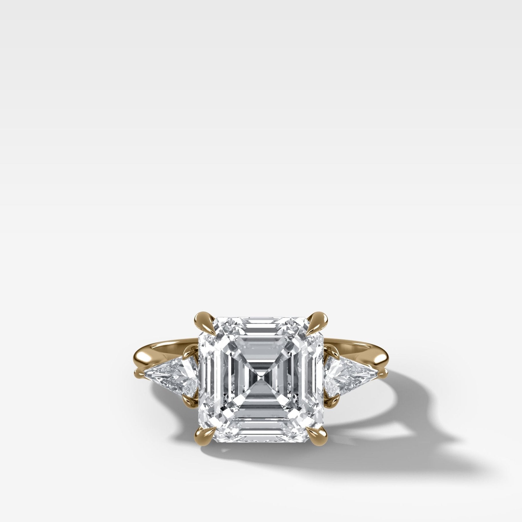 Three Stone Engagement Ring With Kite Side Stones and Asscher Cut Diamond