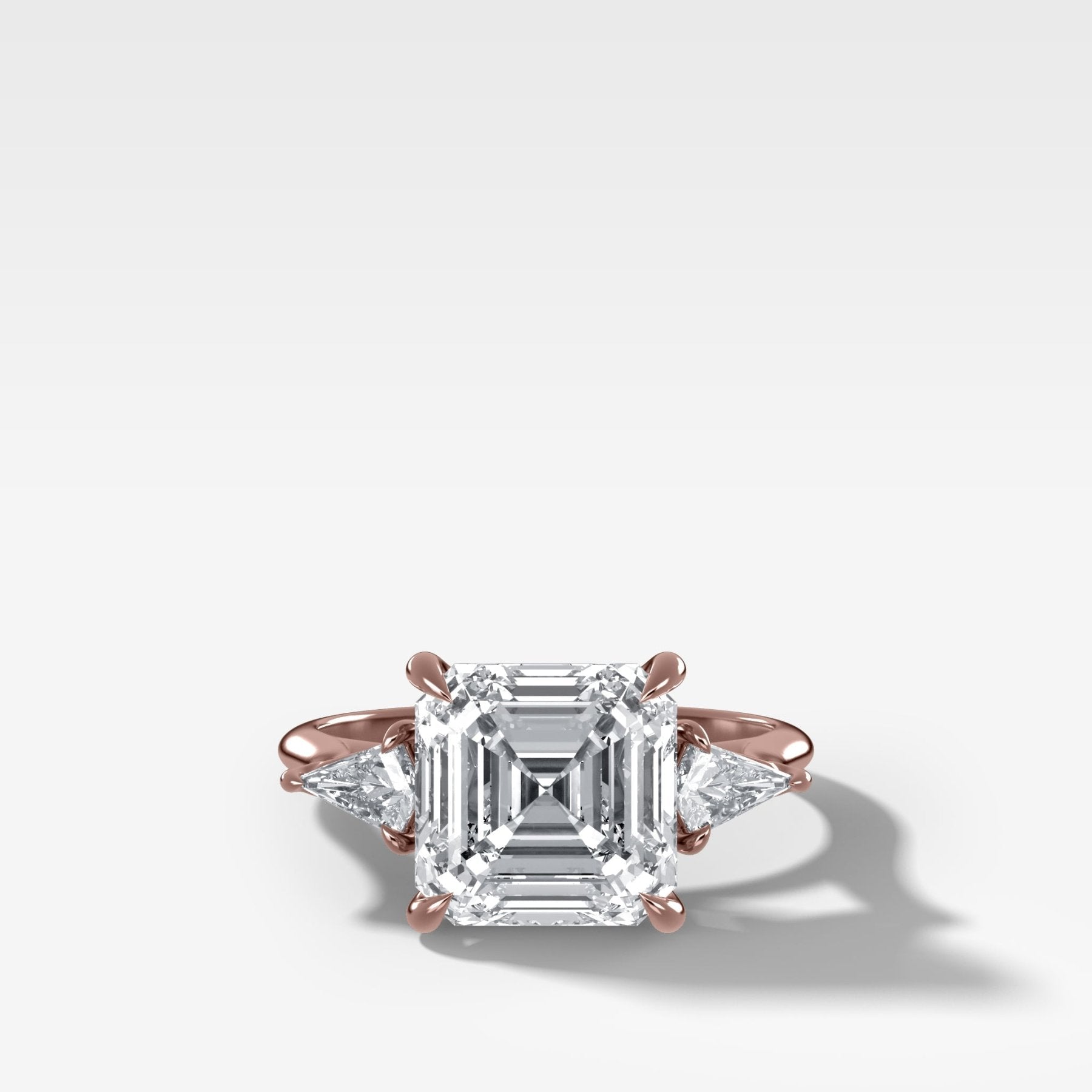 Three Stone Engagement Ring With Kite Side Stones and Asscher Cut Diamond