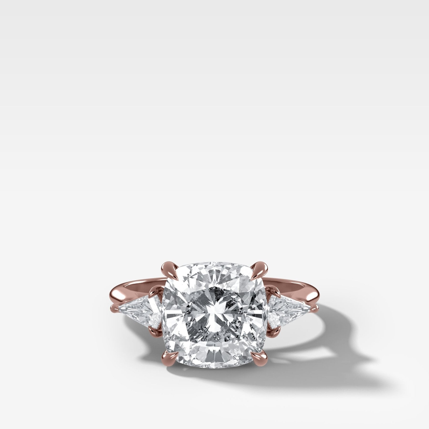 Three Stone Engagement Ring With Kite Side Stones and Cushion Cut Diamond