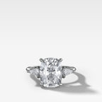 Three Stone Engagement Ring With Kite Side Stones and Elongated Cushion Cut Diamond