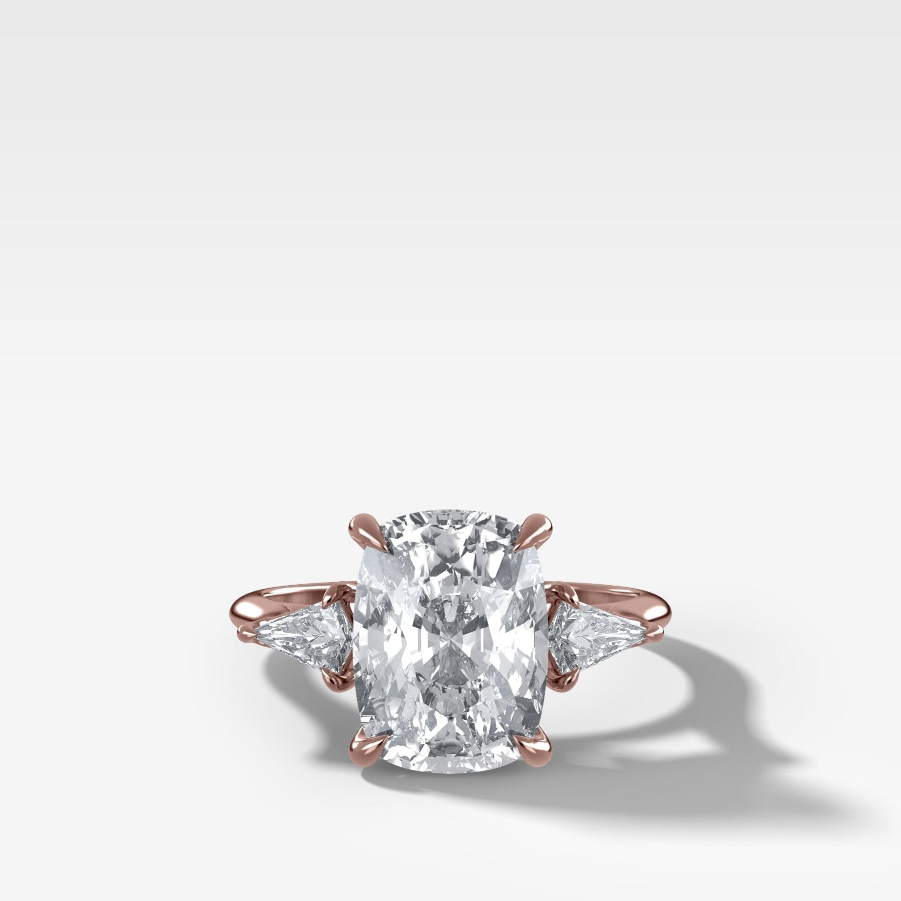 Three Stone Engagement Ring With Kite Side Stones and Elongated Cushion Cut Diamond