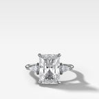 Three Stone Engagement Ring With Kite Side Stones and Elongated Radiant Cut Diamond