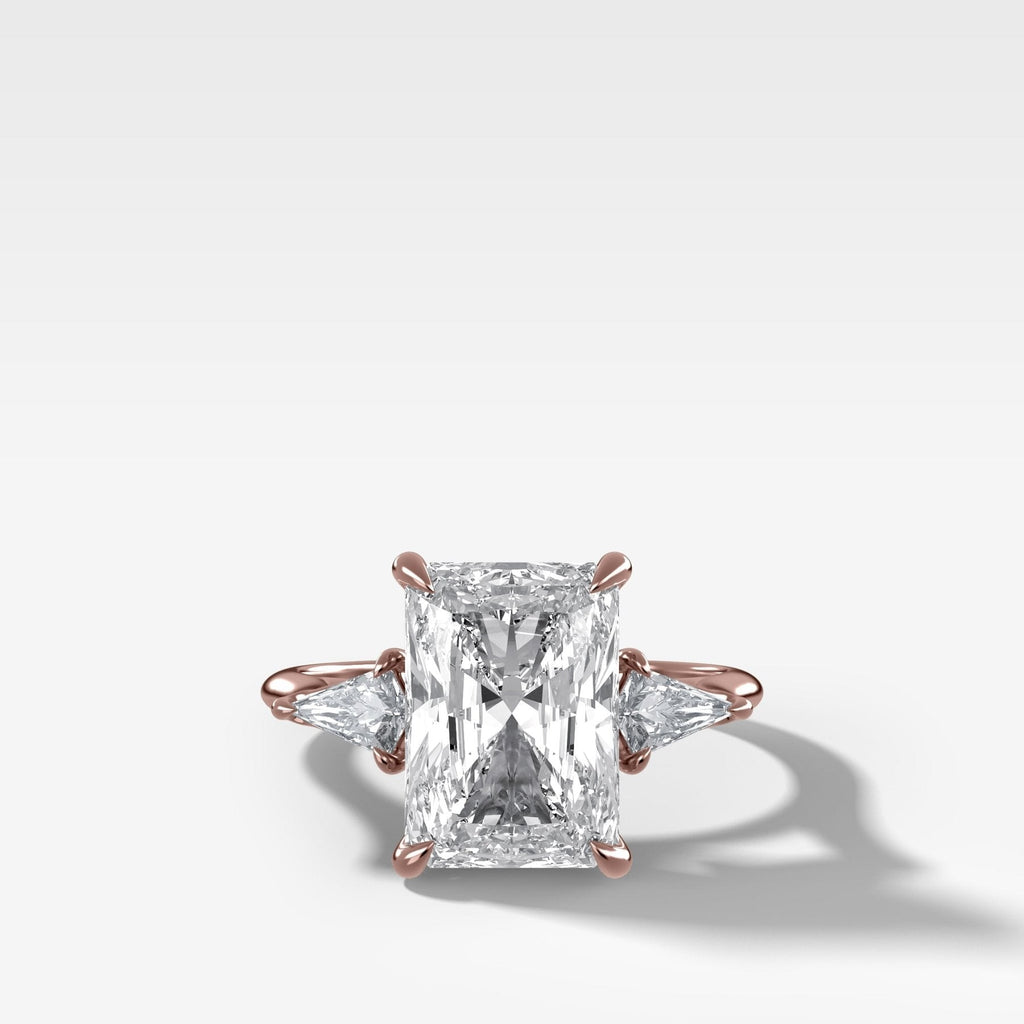 Three Stone Engagement Ring With Kite Side Stones and Elongated Radiant Cut Diamond
