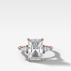 Three Stone Engagement Ring With Kite Side Stones and Elongated Radiant Cut Diamond