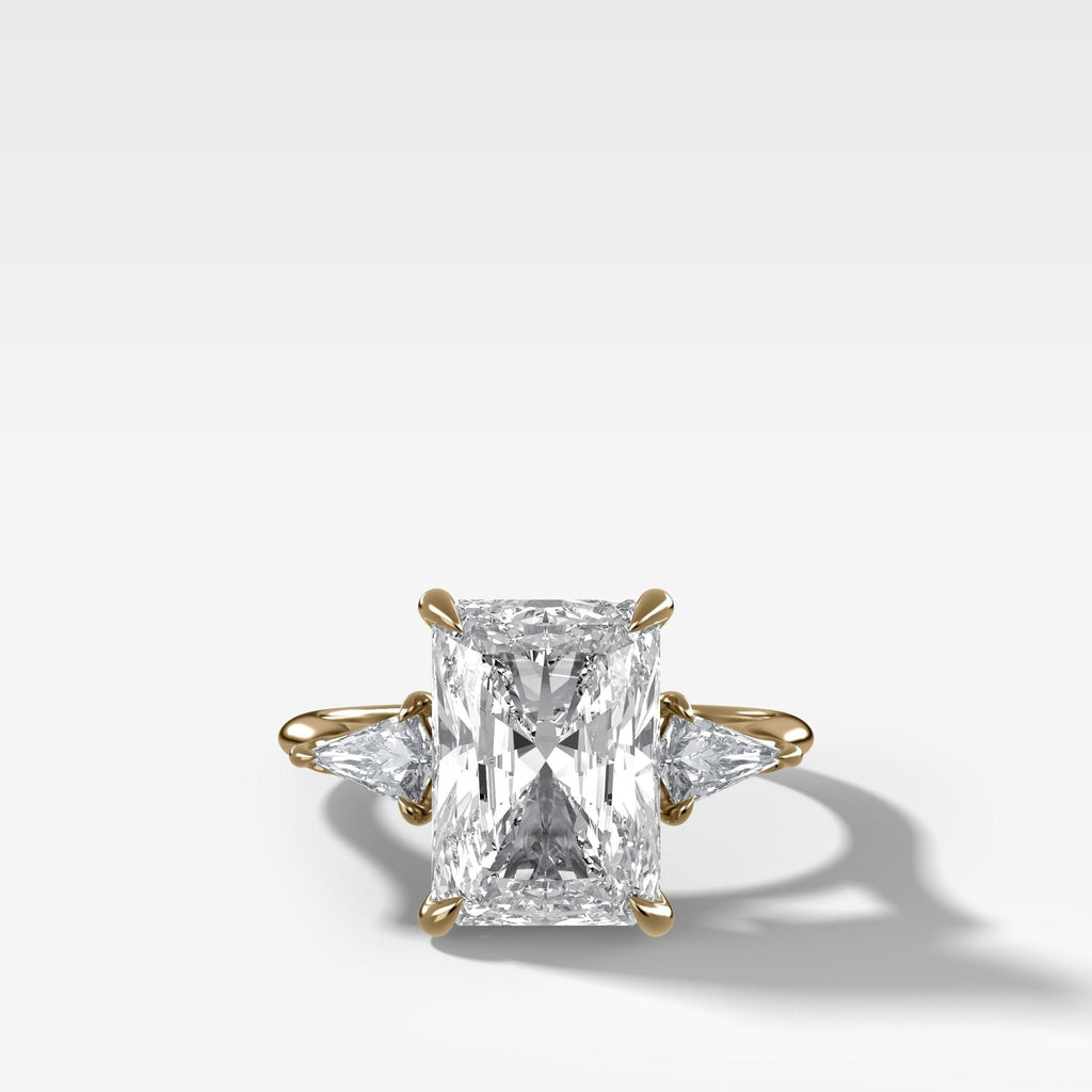 Three Stone Engagement Ring With Kite Side Stones and Elongated Radiant Cut Diamond