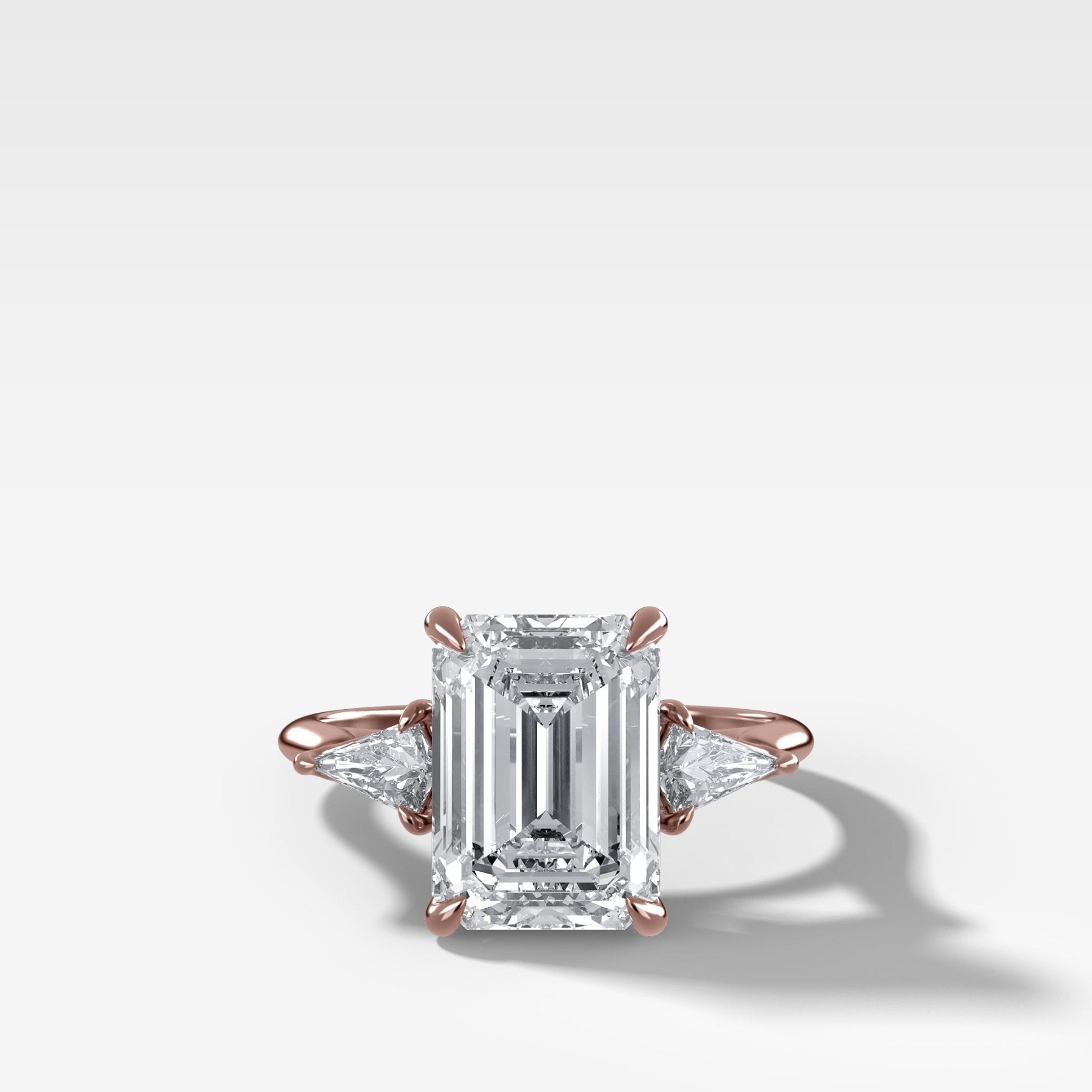 Three Stone Engagement Ring With Kite Side Stones and Emerald Cut Diamond