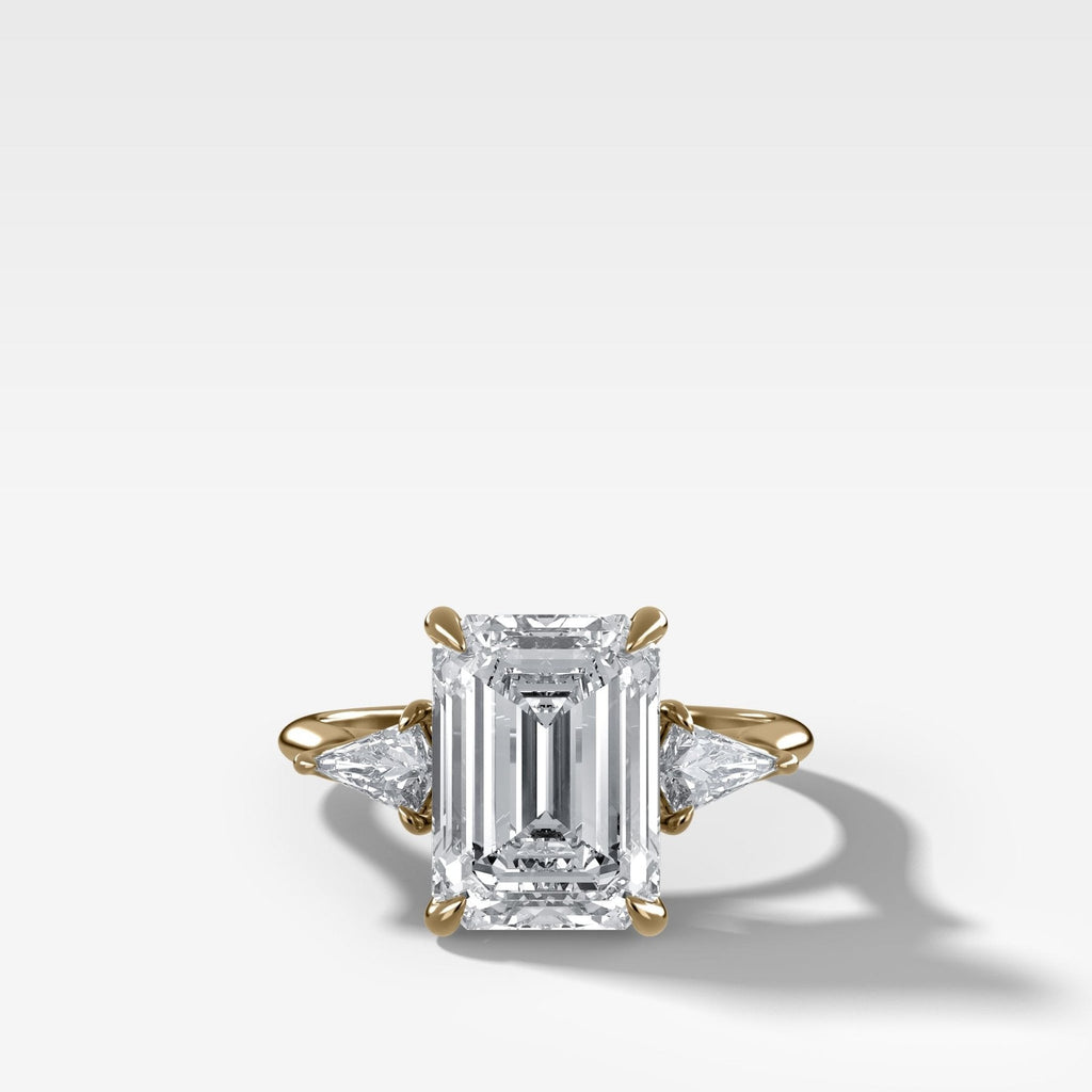 Three Stone Engagement Ring With Kite Side Stones and Emerald Cut Diamond
