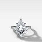 Three Stone Engagement Ring With Kite Side Stones and Marquise Cut Diamond