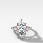Three Stone Engagement Ring With Kite Side Stones and Marquise Cut Diamond