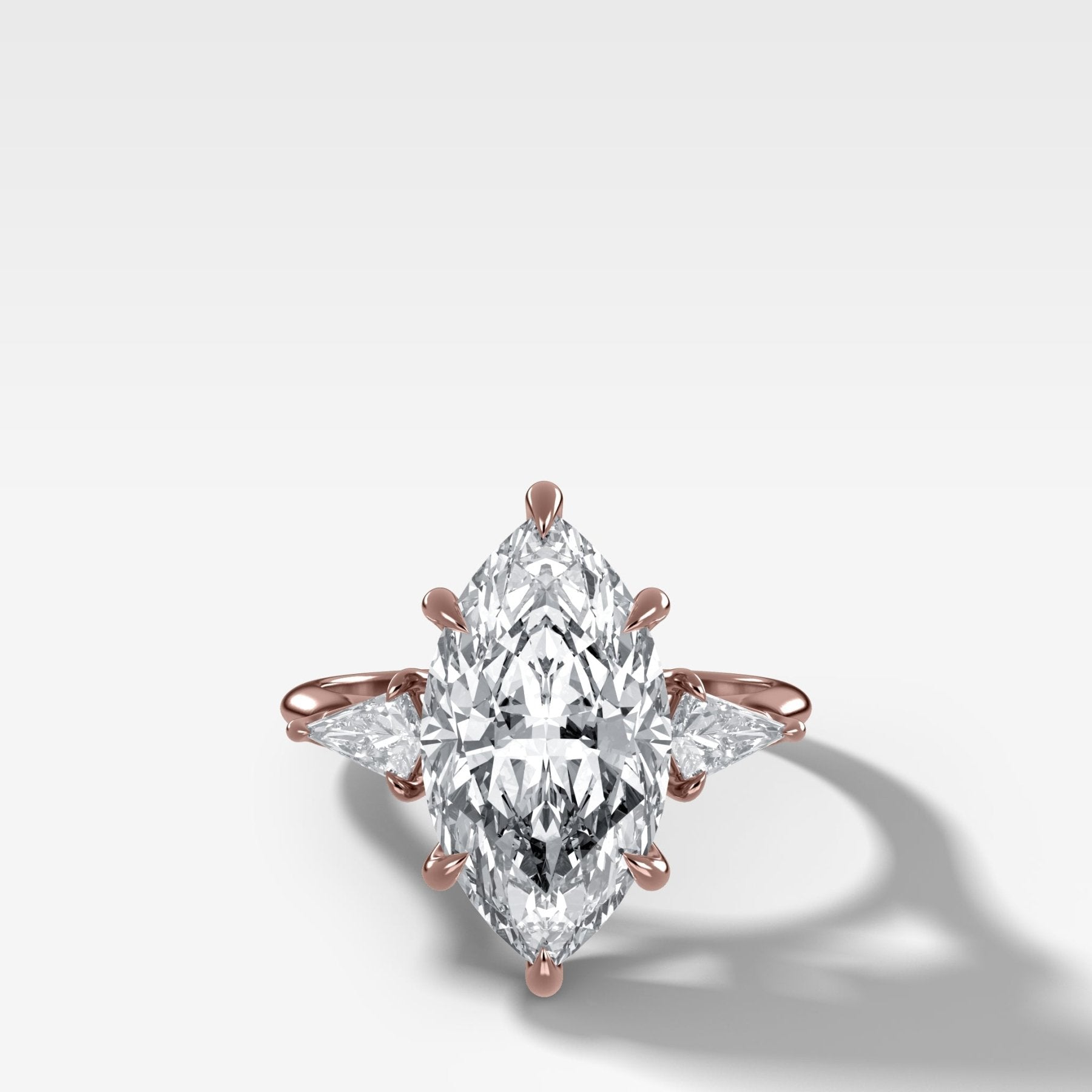 Three Stone Engagement Ring With Kite Side Stones and Marquise Cut Diamond