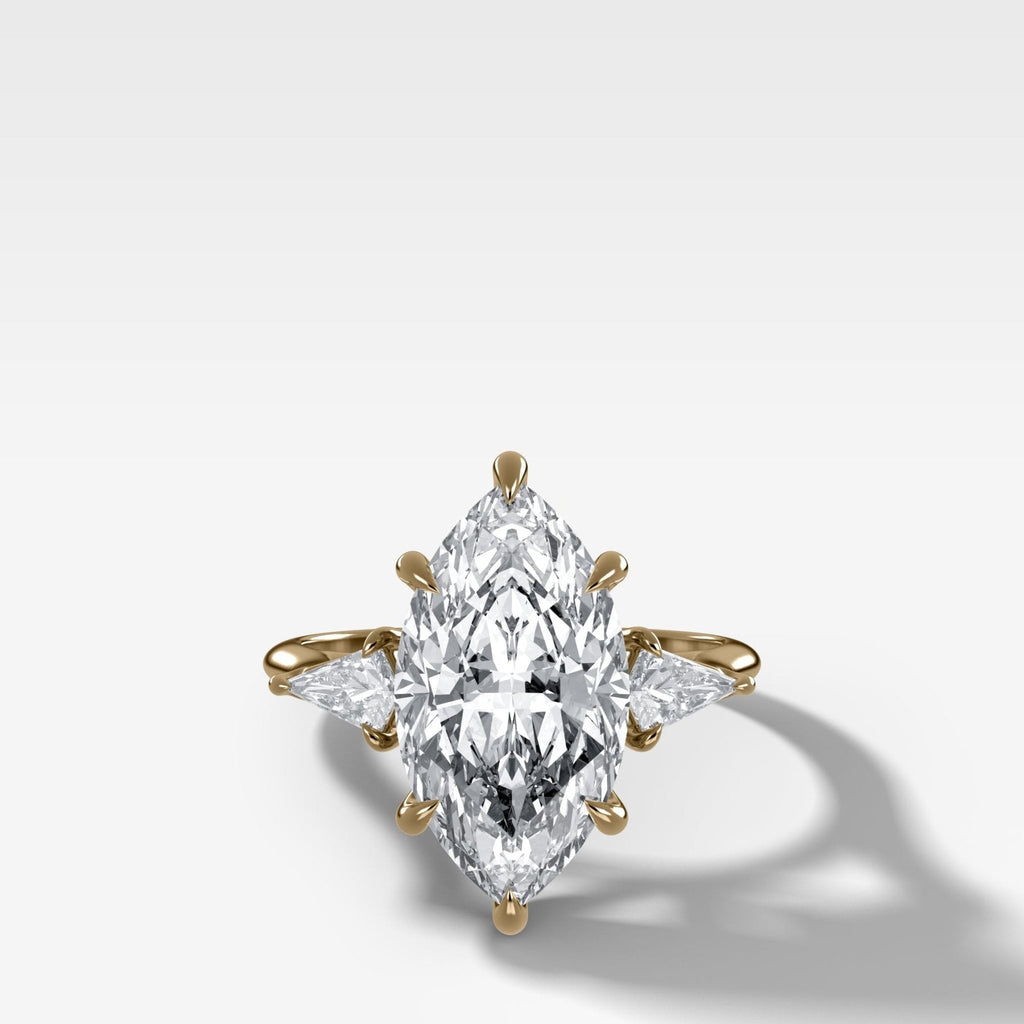 Three Stone Engagement Ring With Kite Side Stones and Marquise Cut Diamond