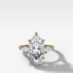 Three Stone Engagement Ring With Kite Side Stones and Marquise Cut Diamond