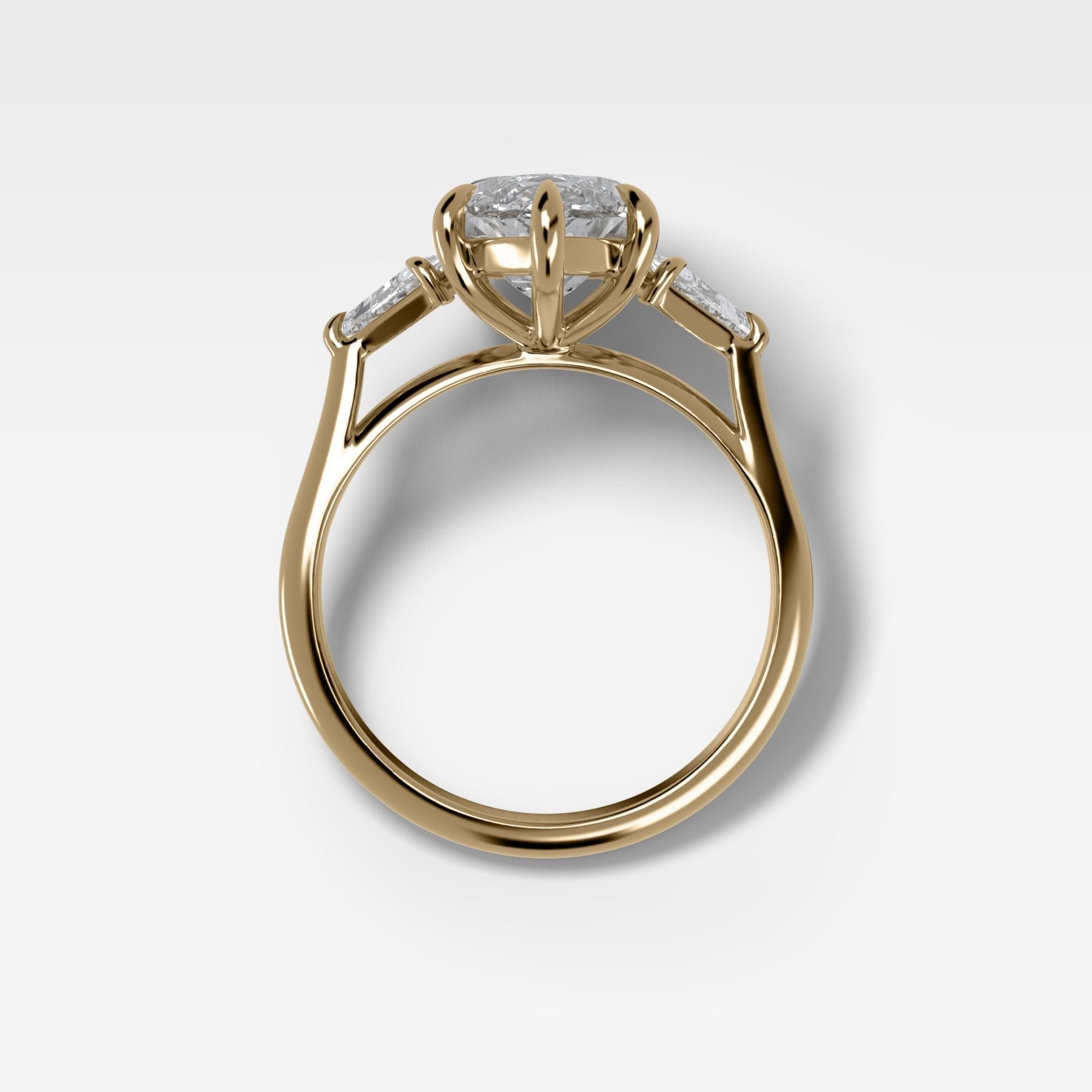 Three Stone Engagement Ring With Kite Side Stones and Marquise Cut Diamond