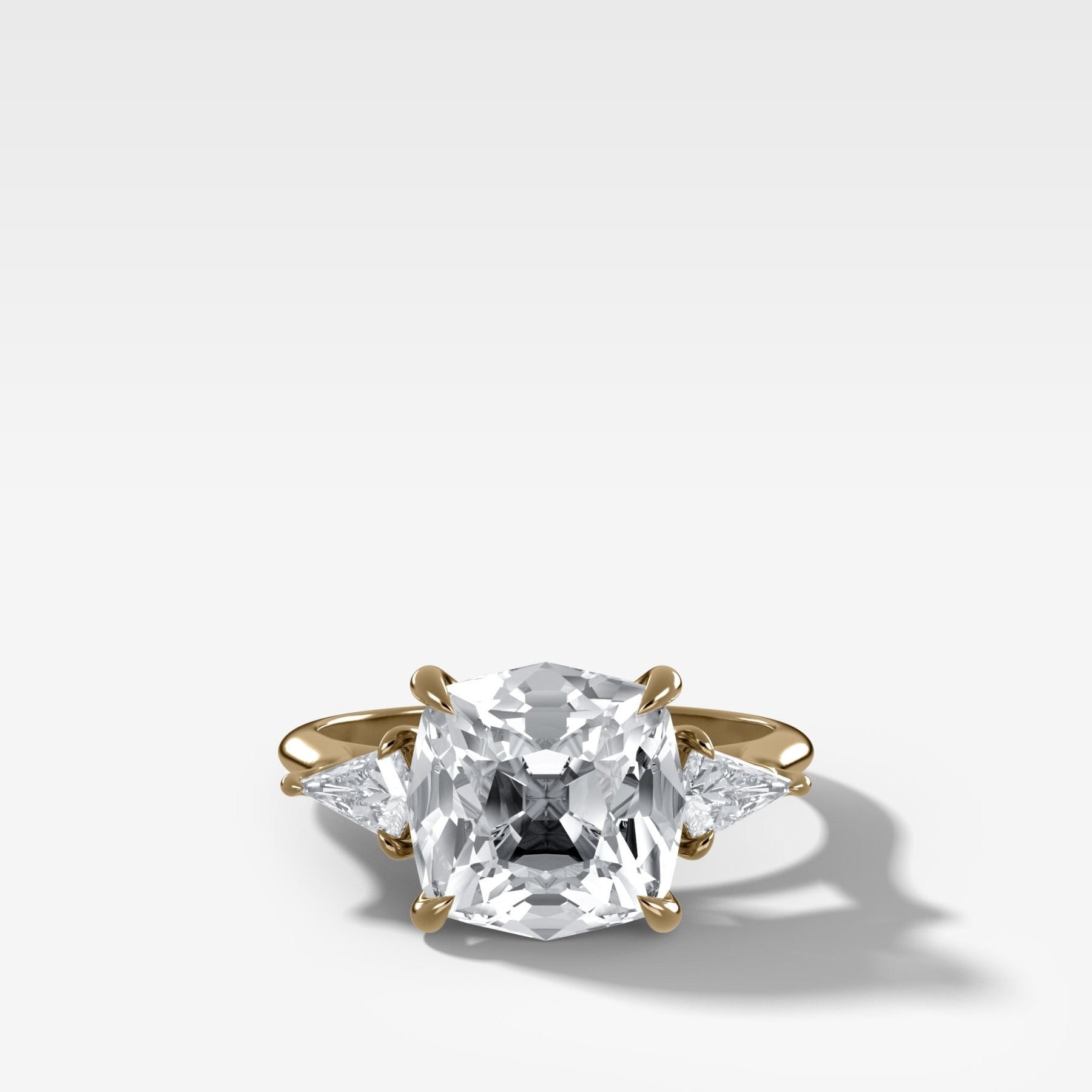 Three Stone Engagement Ring With Kite Side Stones and Old Mine Cut Diamond