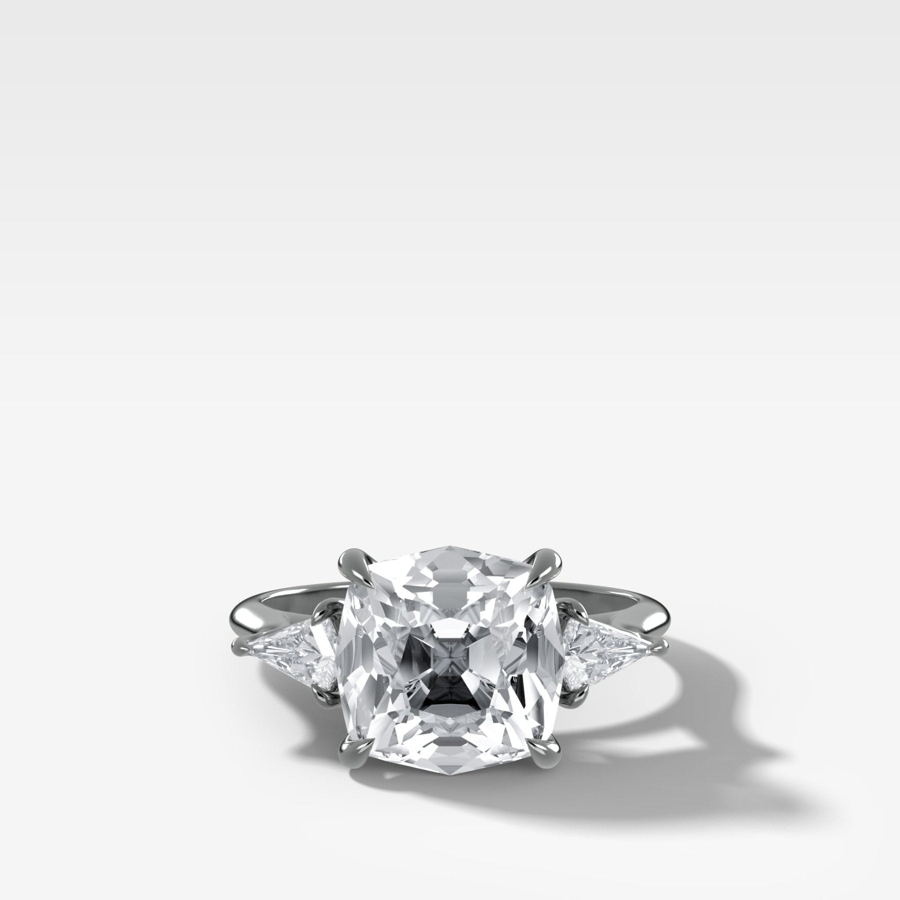 Three Stone Engagement Ring With Kite Side Stones and Old Mine Cut Diamond
