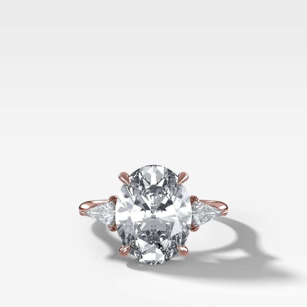 Three Stone Engagement Ring With Kite Side Stones and Oval Cut Diamond