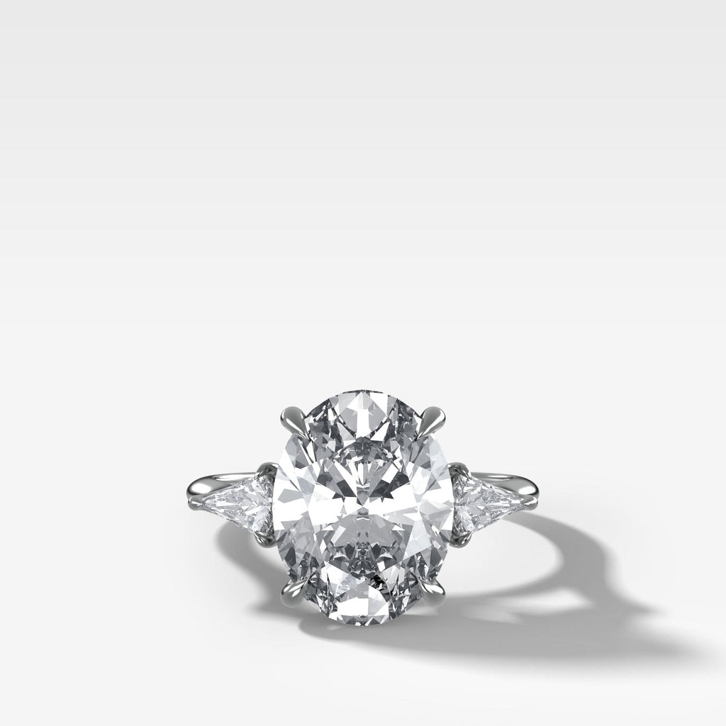 Three Stone Engagement Ring With Kite Side Stones and Oval Cut Diamond