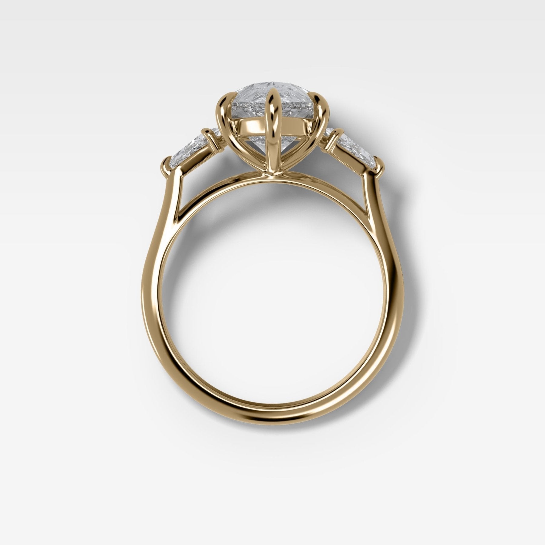Three Stone Engagement Ring With Kite Side Stones and Pear Cut Diamond