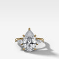 Three Stone Engagement Ring With Kite Side Stones and Pear Cut Diamond