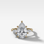Three Stone Engagement Ring With Kite Side Stones and Pear Cut Diamond