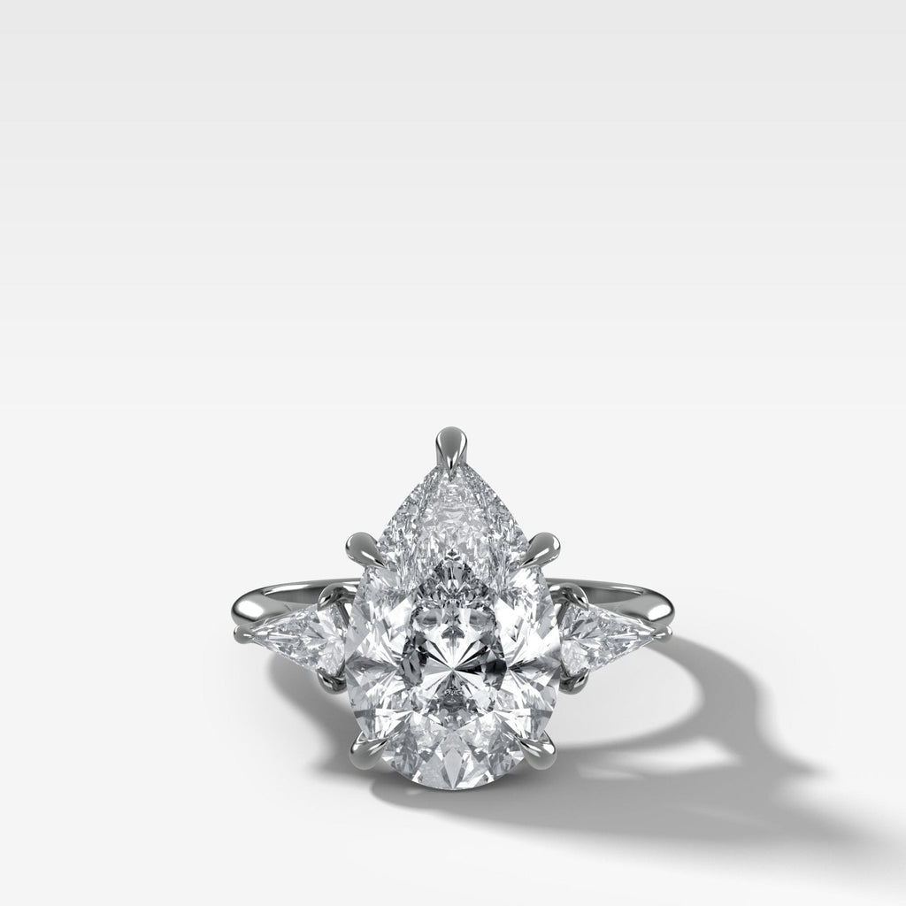 Three Stone Engagement Ring With Kite Side Stones and Pear Cut Diamond