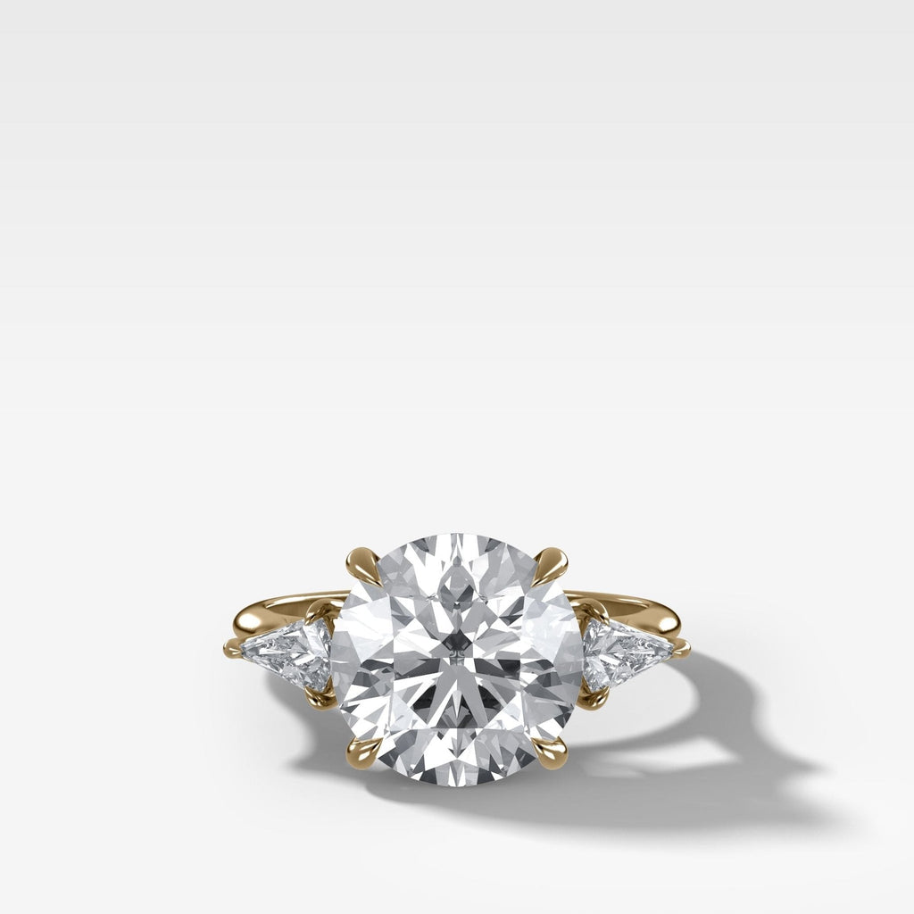 Three Stone Engagement Ring With Kite Side Stones and Round Cut Diamond