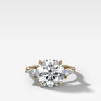 Three Stone Engagement Ring With Kite Side Stones and Round Cut Diamond