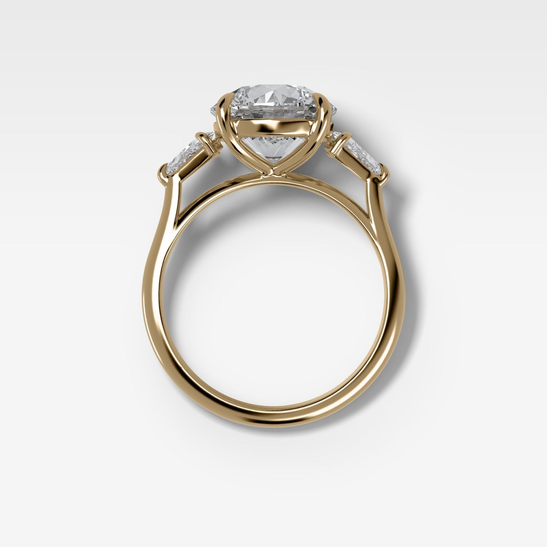 Three Stone Engagement Ring With Kite Side Stones and Round Cut Diamond