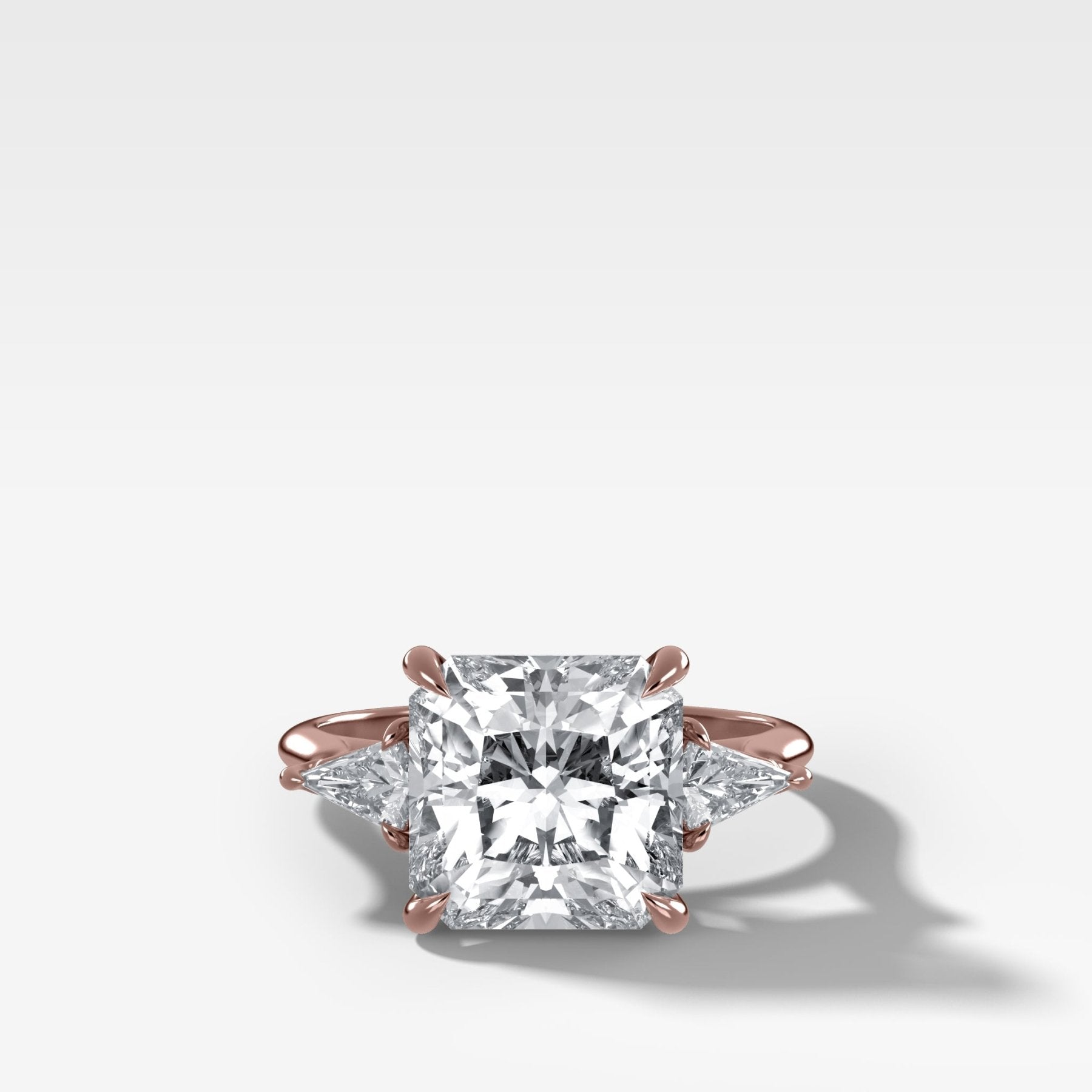 Three Stone Engagement Ring With Kite Side Stones and Square Radiant Cut Diamond