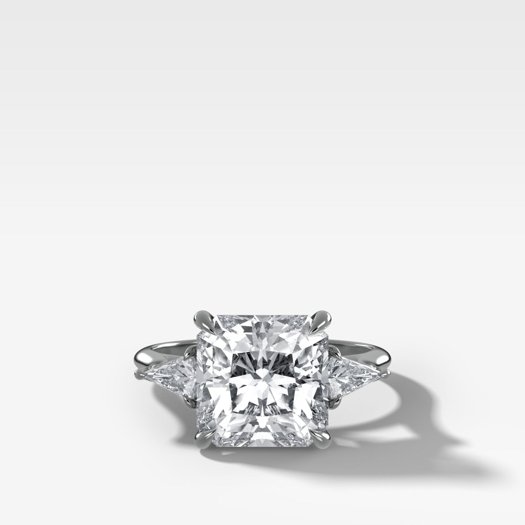 Three Stone Engagement Ring With Kite Side Stones and Square Radiant Cut Diamond