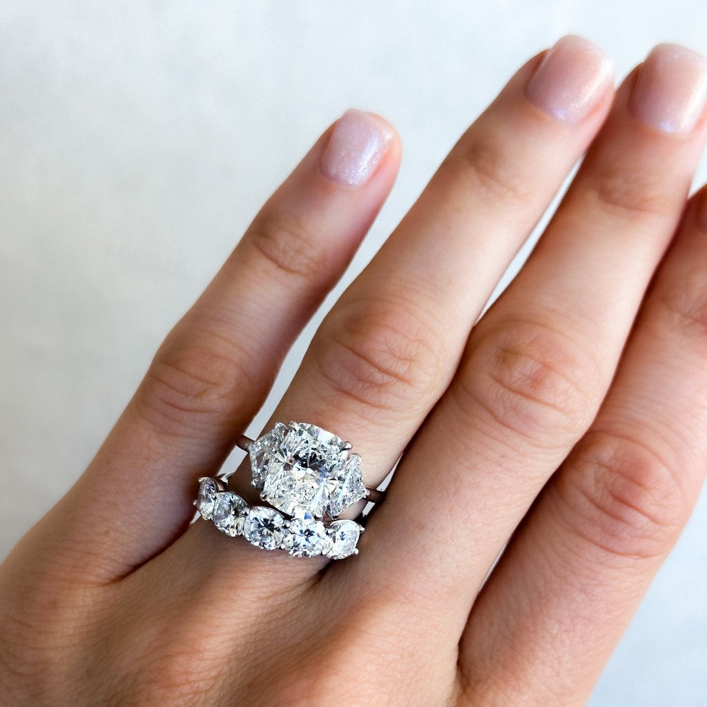 Three Stone Engagement Ring with Shield Side Stones and an Elongated Cushion cut Diamond