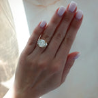 Three Stone Engagement Ring with Shield Side Stones and an Elongated Cushion cut Diamond