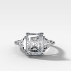 Three Stone Engagement Ring with Shield Side Stones and an Elongated Radiant cut Diamond