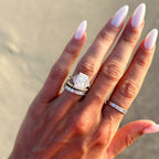 Three Stone Engagement Ring with Shield Side Stones and an Elongated Radiant cut Diamond