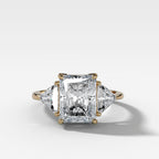 Three Stone Engagement Ring with Shield Side Stones and an Elongated Radiant cut Diamond