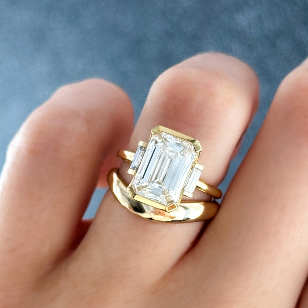 Three Stone Half Bezel Engagement Ring with Mini Baguette Side Stones and Emerald Cut Diamond No.1