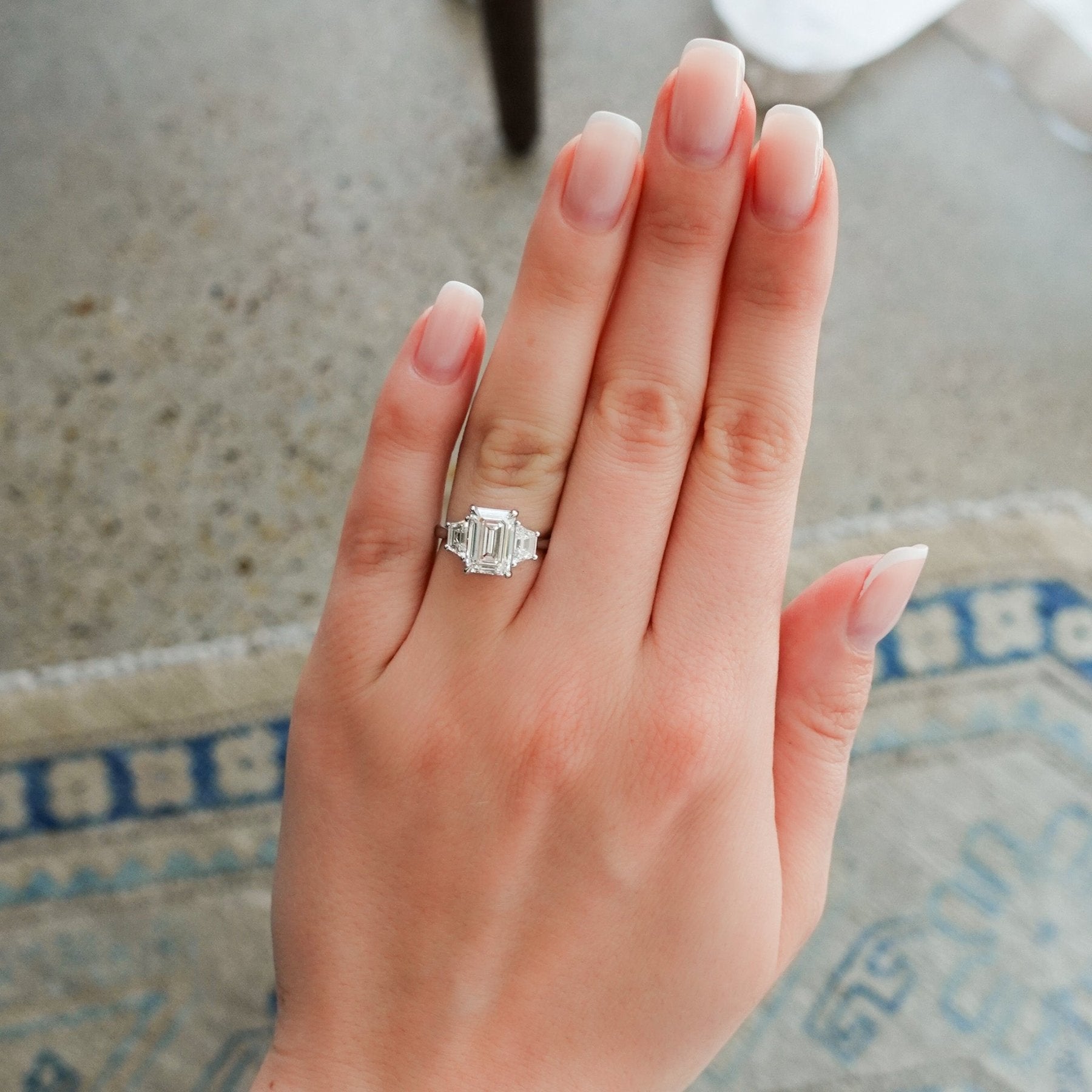 Three Stone Ring with Trapezoid Side Diamonds set with 2.51ct Lab Grown Emerald Cut Diamond