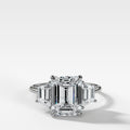 Three Stone Ring with Trapezoid Side Diamonds set with 2.51ct Lab Grown Emerald Cut Diamond