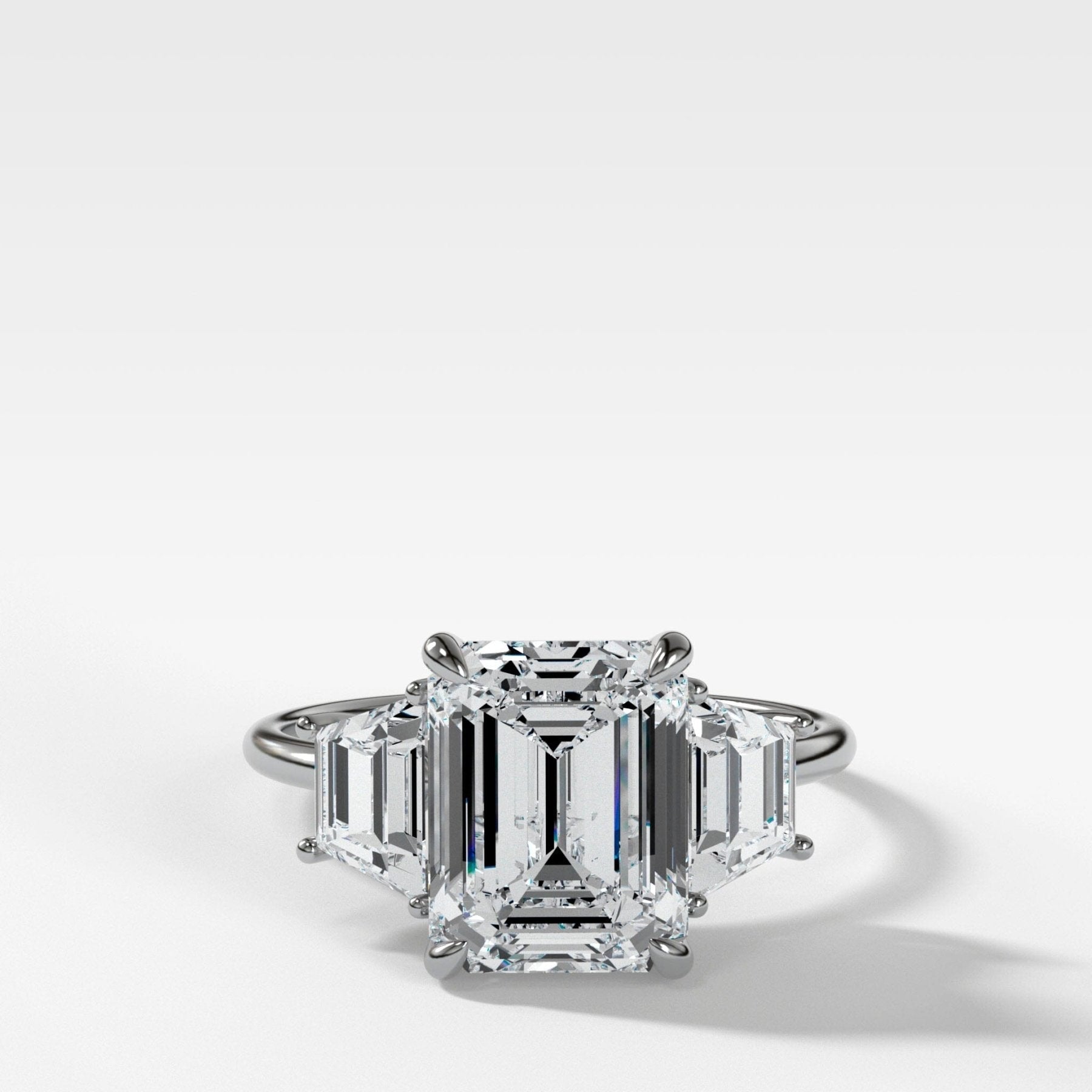 Three Stone Ring with Trapezoid Side Diamonds set with 2.51ct Lab Grown Emerald Cut Diamond